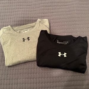 Set of 2 men’s Under Armor dry fit shirts (one L, one XL)